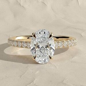Oval Solitaire Pavé Engagement Ring in Yellow Gold